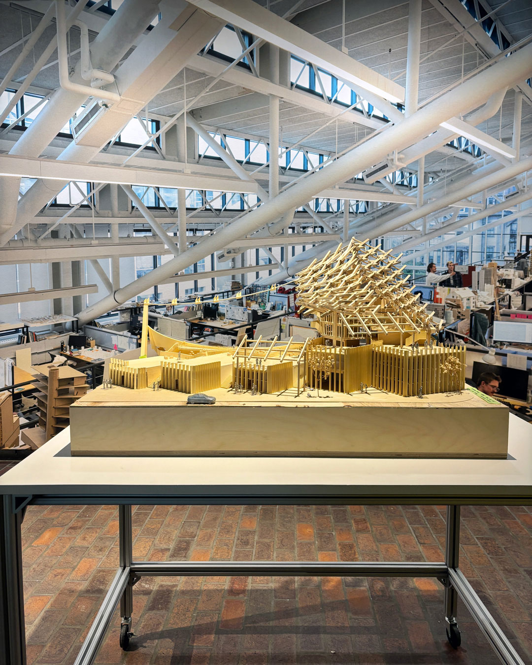 An architecture model on a table in the Druker Design Gallery.