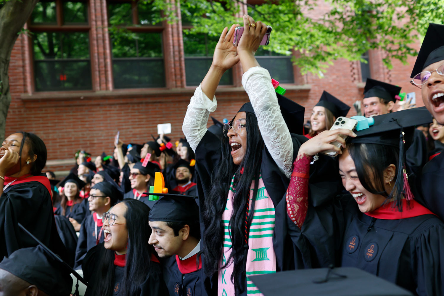 A group of students in commencement regalia