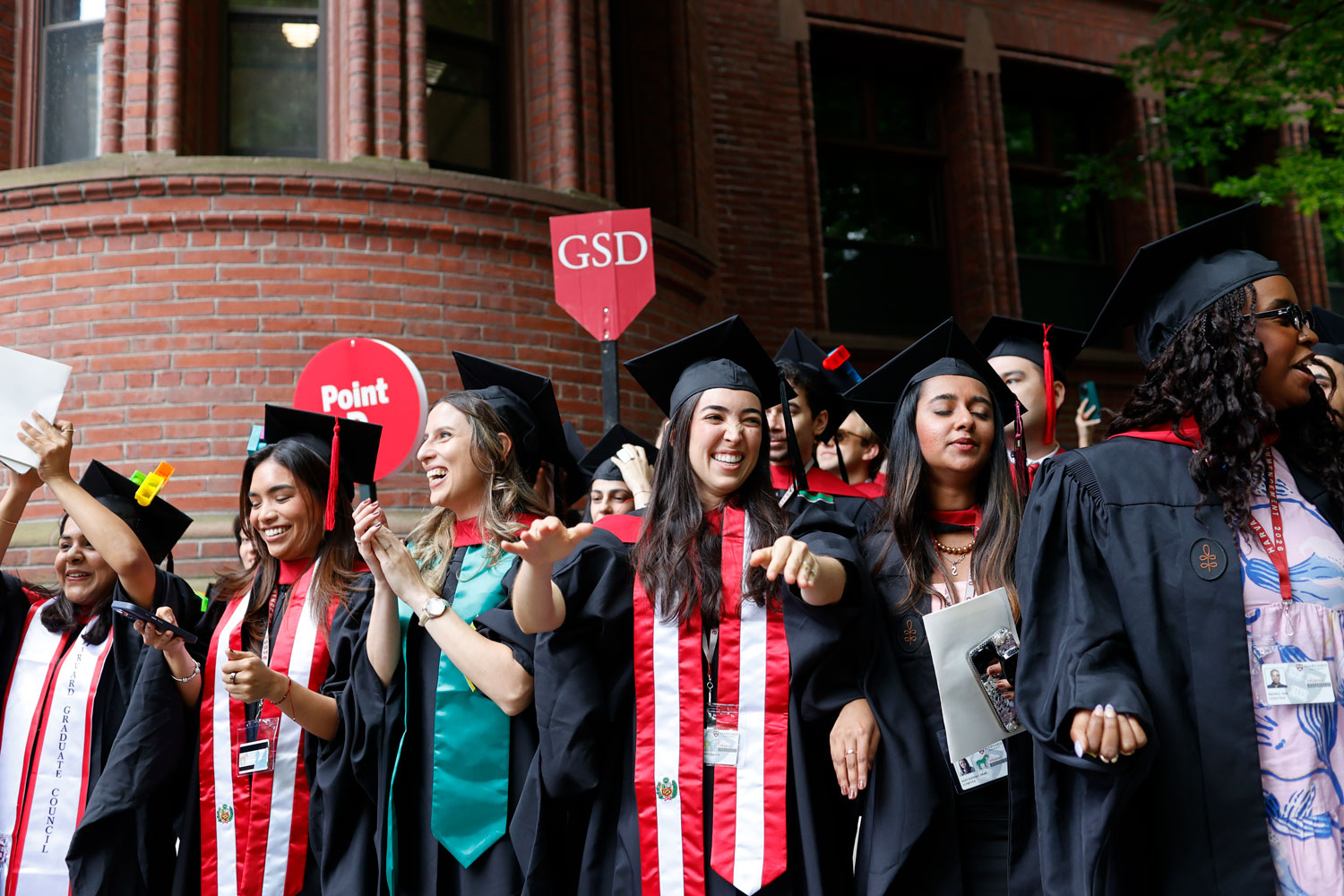 A group of students in commencement regalia