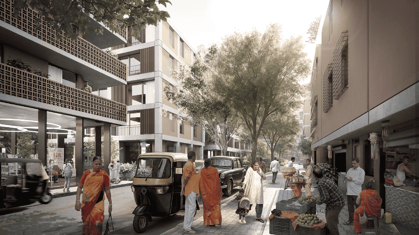 A bustling city scene where people are walking in a street flanked by buildings.