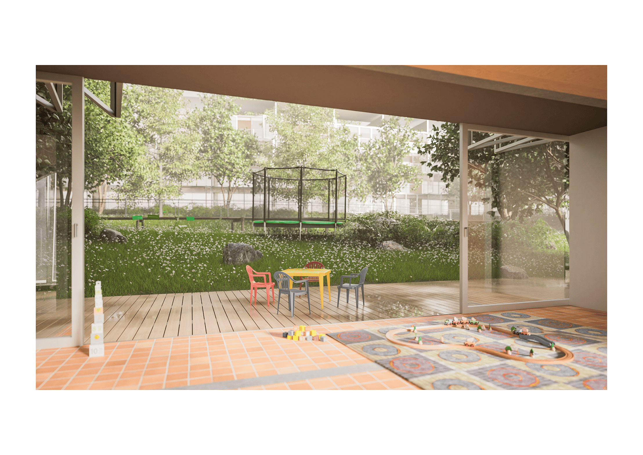 A spacious room with large windows overlooks a grassy yard with a trampoline. The room has a colorful play area with a patterned rug, small chairs around a table, and various toys scattered on the floor. The outdoor area is surrounded by trees and greenery.