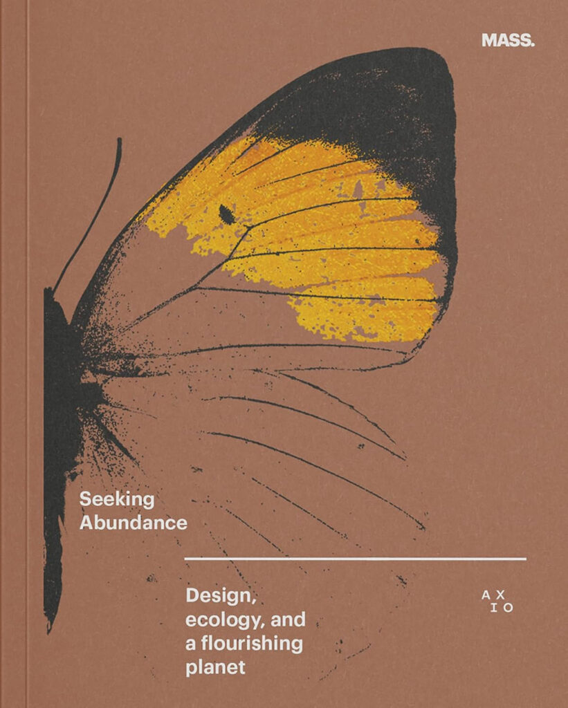Book cover showing butterfly wing on a brown background with white writing.