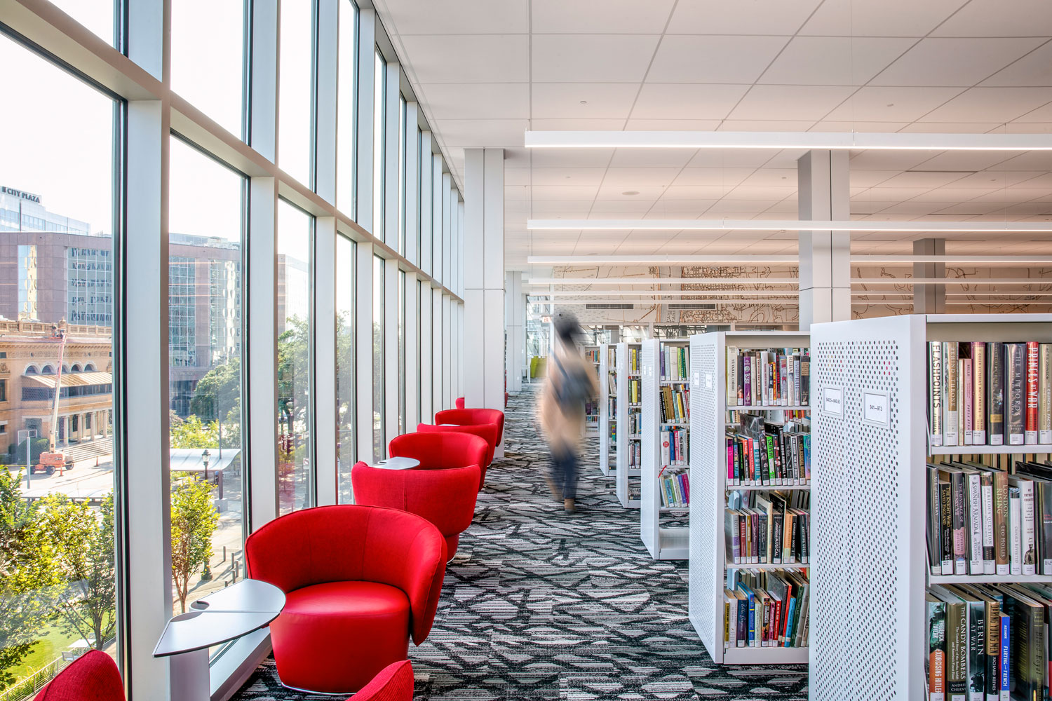 View inside a new building with a large bank of windows.