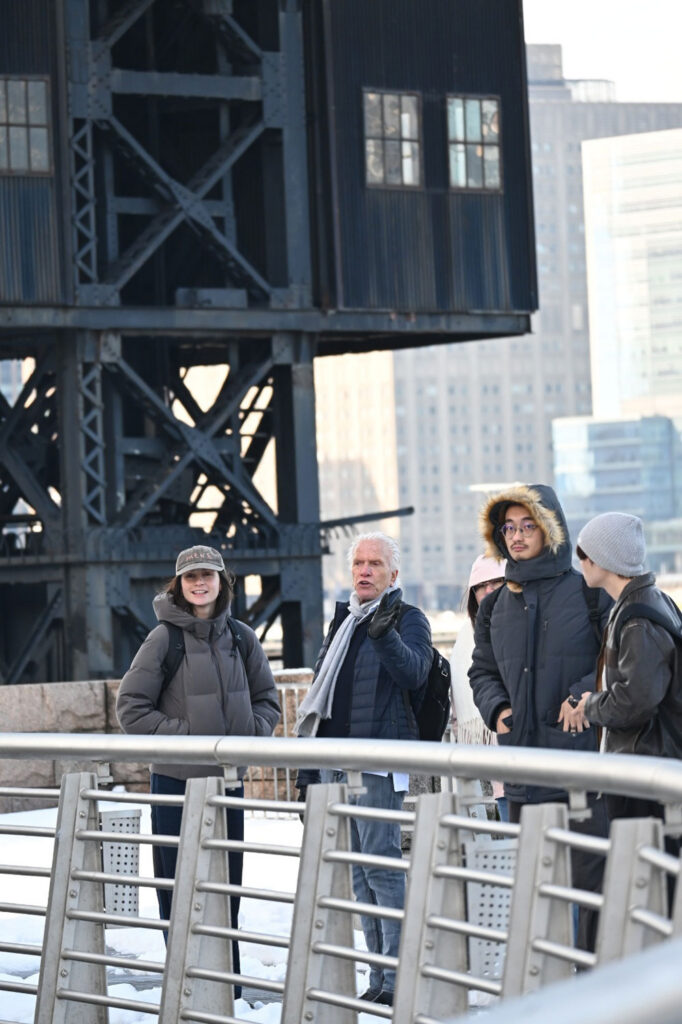 People standing in industrial neighborhood.