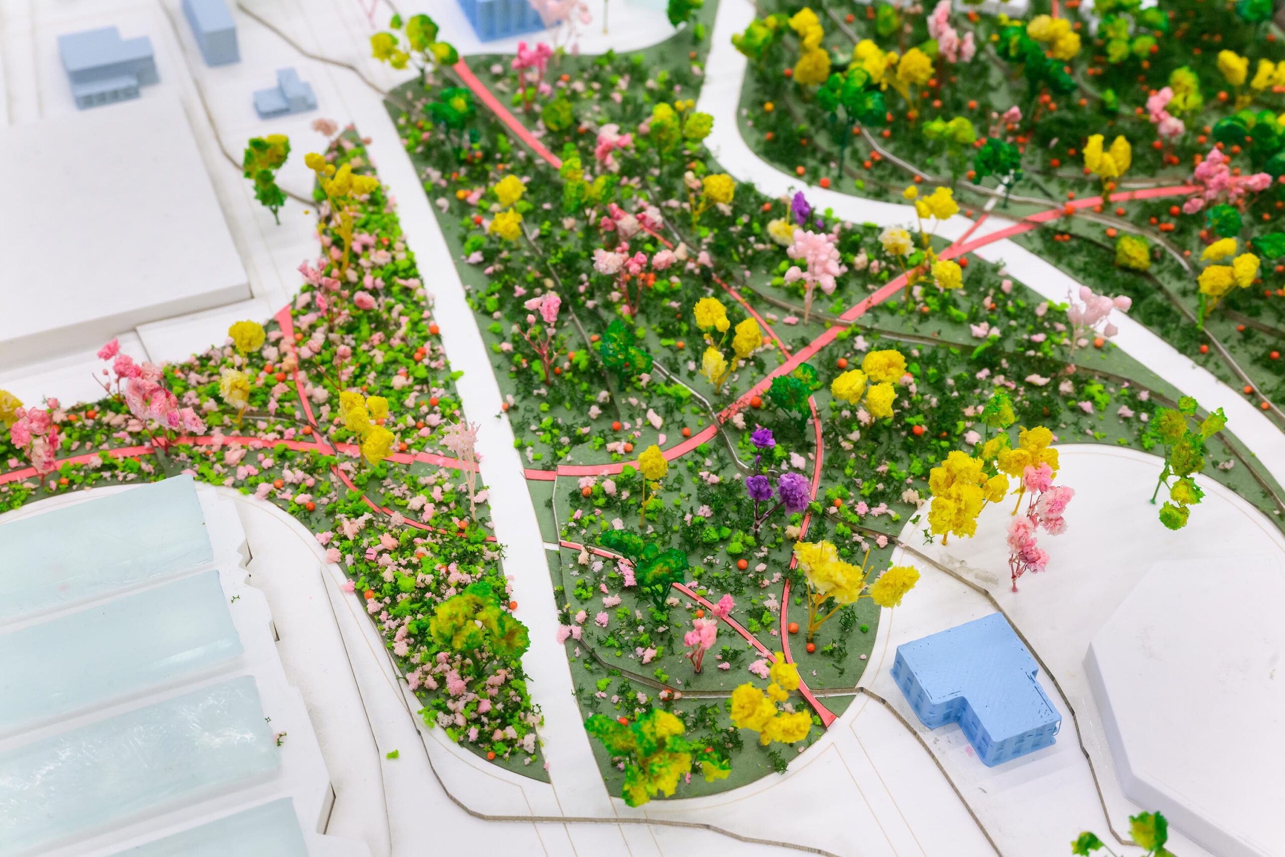 Image of scale model of green landscape with trees