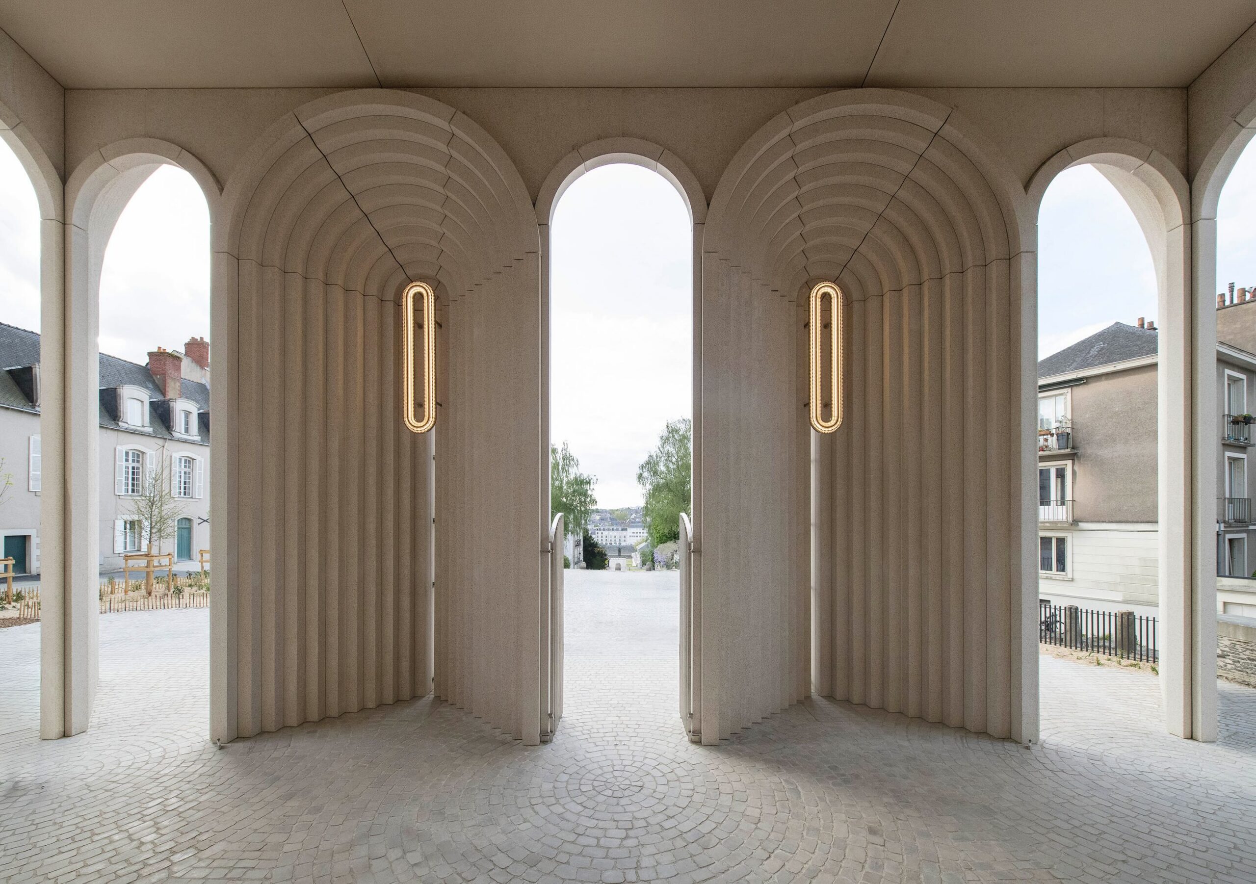 View of courtyard through archways.