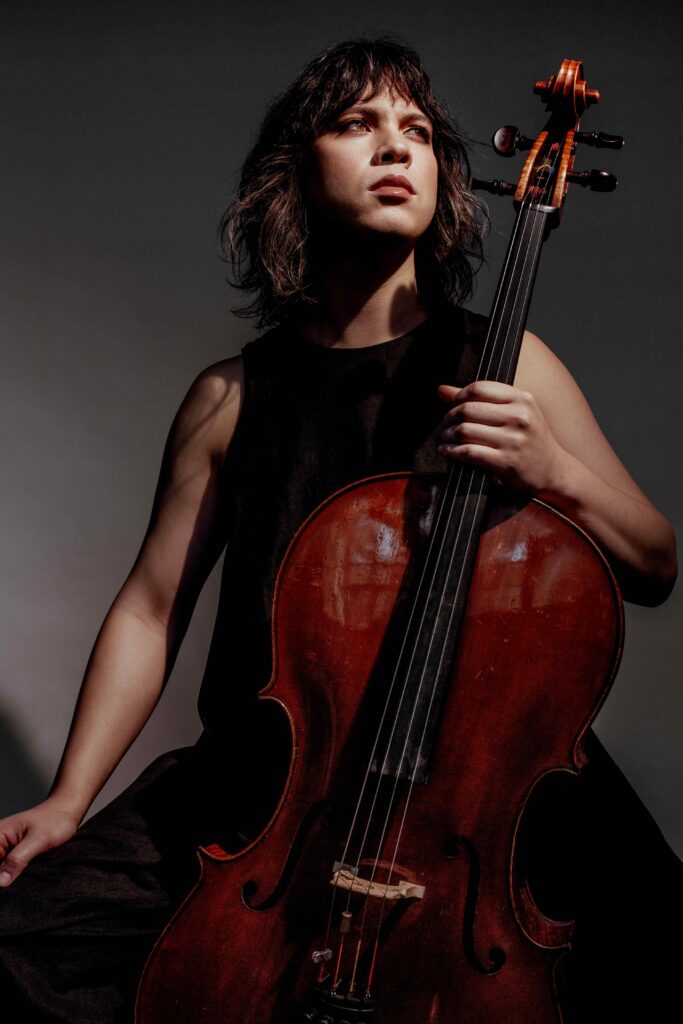 Andrew Yee Headshot in color with cello.