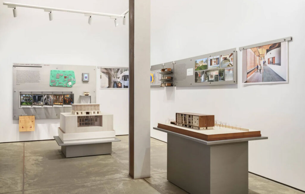 An installation view of an architecture exhibition in Mumbai featuring projects by RMA Architects.