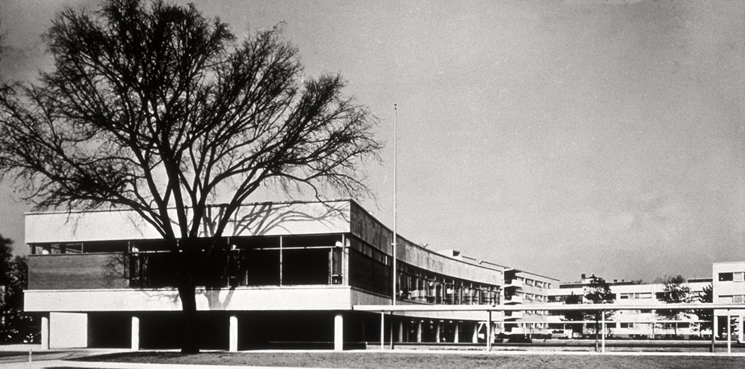Modern building curving into distance.
