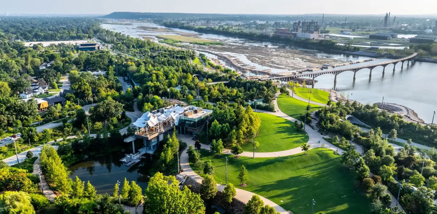 Aerial view of landscape and trees and waterway.
