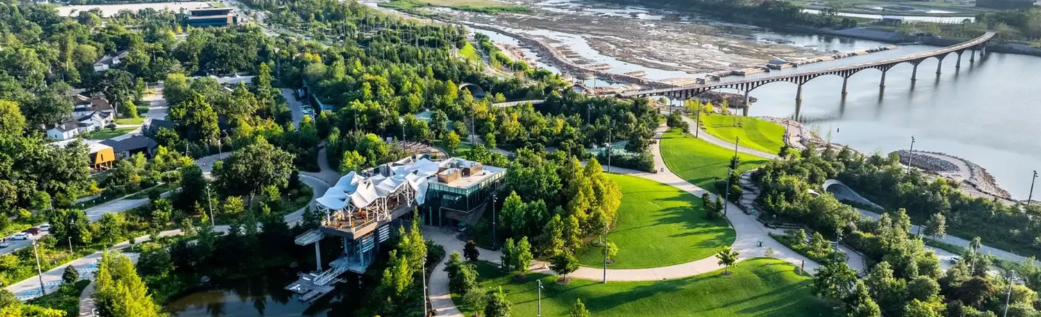 Aerial view of landscape and trees and waterway.