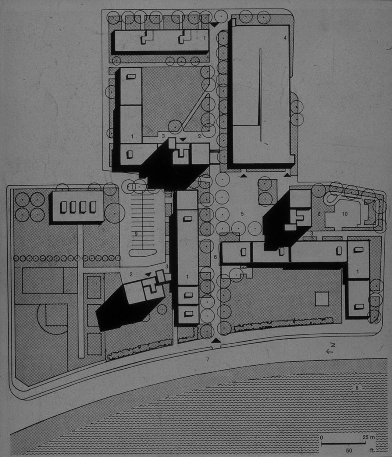 Black and white site plan of a building complex.